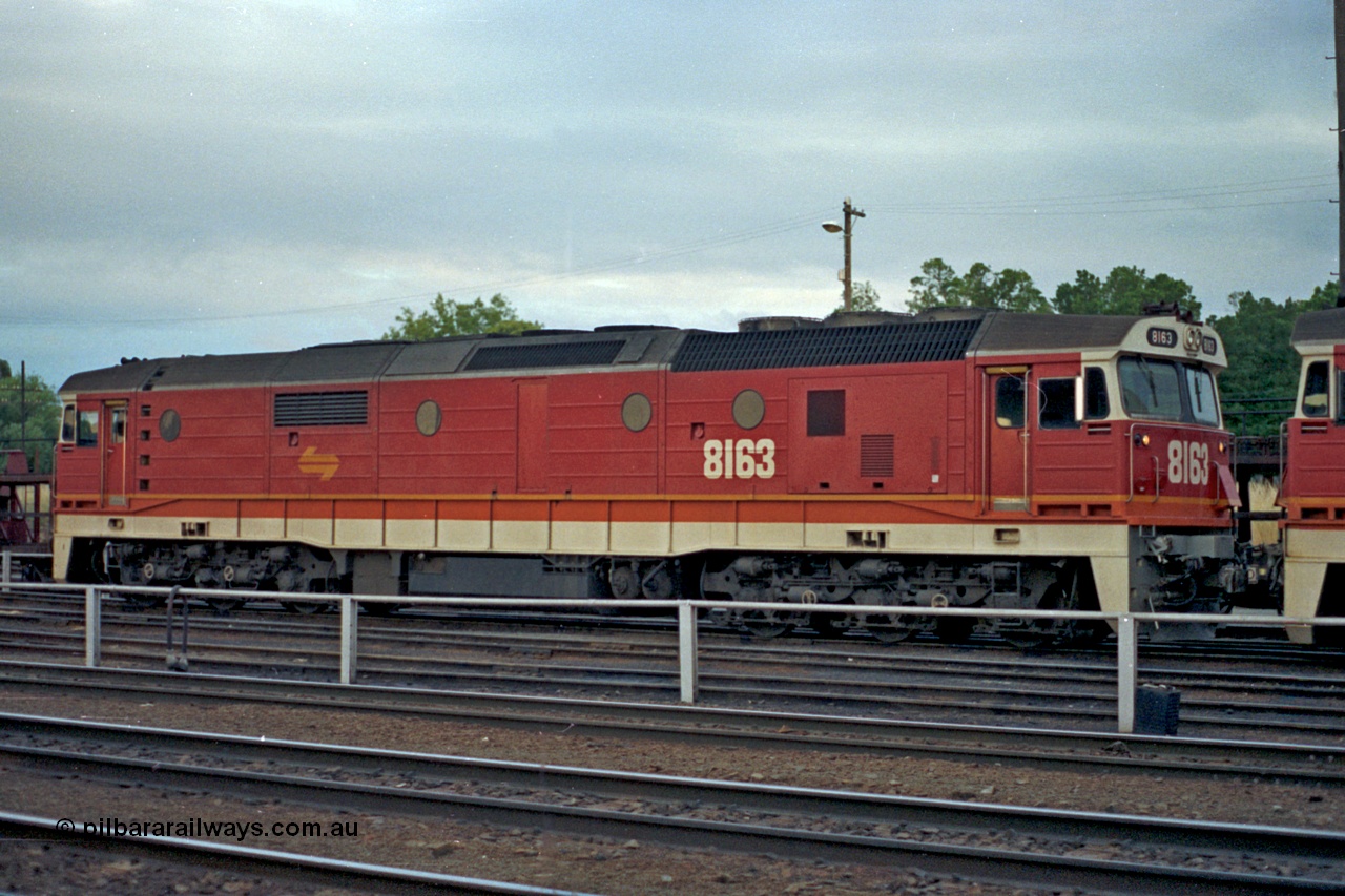 100-07
Albury yard, NSWSRA standard gauge 81 class 8163 Clyde Engineering EMD model JT26C-2SS serial 84-1082, candy livery.
Keywords: 81-class;8163;Clyde-Engineering-Kelso-NSW;EMD;JT26C-2SS;84-1082;