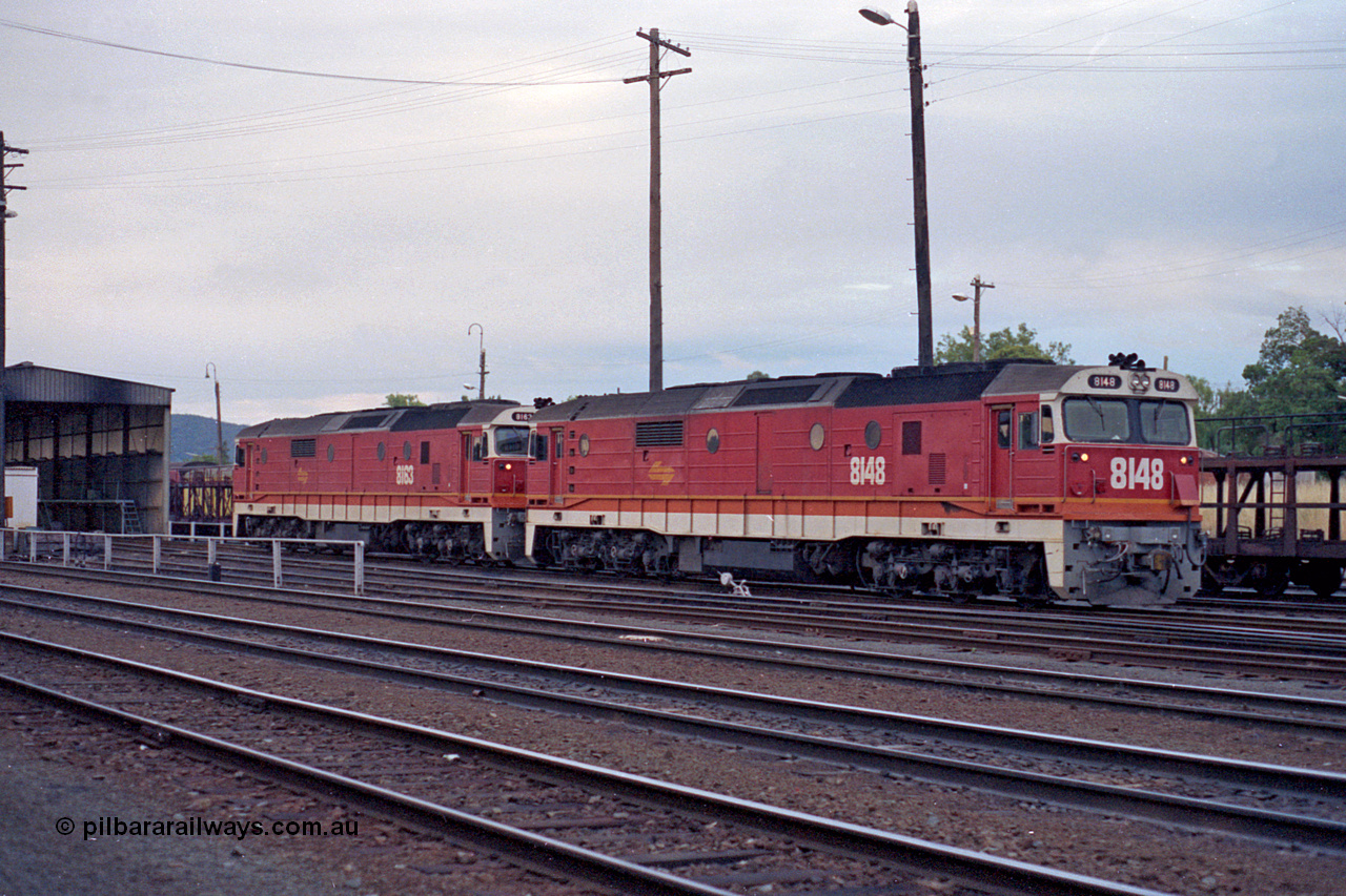 100-09
Albury yard, NSWSRA standard gauge 81 class 8148 Clyde Engineering EMD model JT26C-2SS serial 84-1067 and 8163 serial 84-1082, candy livery.
Keywords: 81-class;8148;Clyde-Engineering-Kelso-NSW;EMD;JT26C-2SS;84-1067;8163;84-1082;