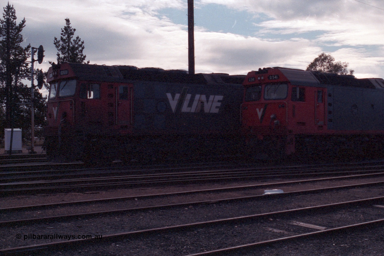 101-10
Maryborough, broad gauge V/Line G class leader G 511 Clyde Engineering EMD model JT26C-2SS serial 84-1239 and G 541 serial 89-1274 cab side shot.
Keywords: G-class;G511;Clyde-Engineering-Rosewater-SA;EMD;JT26C-2SS;84-1239;G541;89-1274;