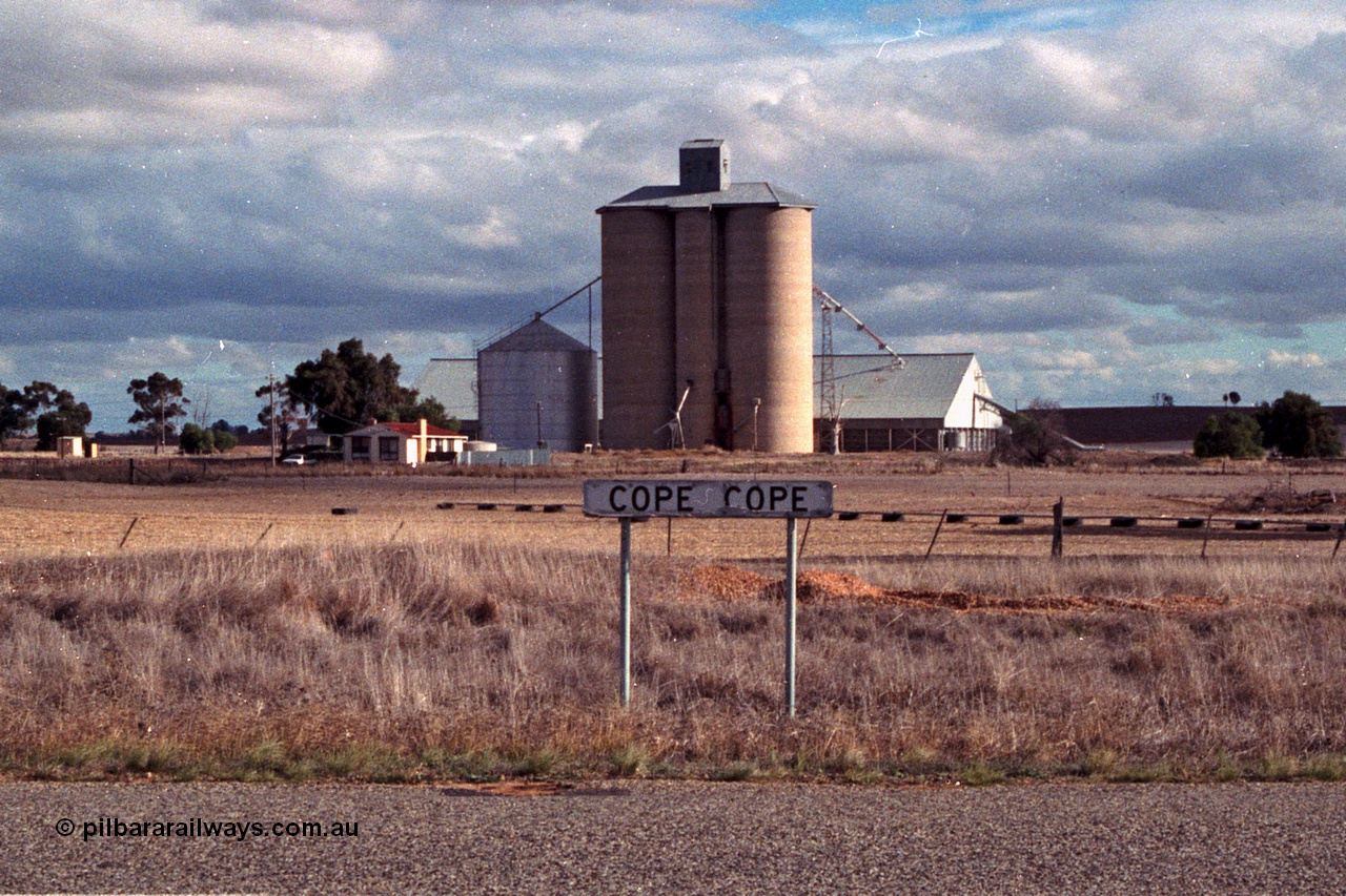 101-18
Cope Cope Geelong style silo complex with steel annex and horizontal grain bunker overview.
