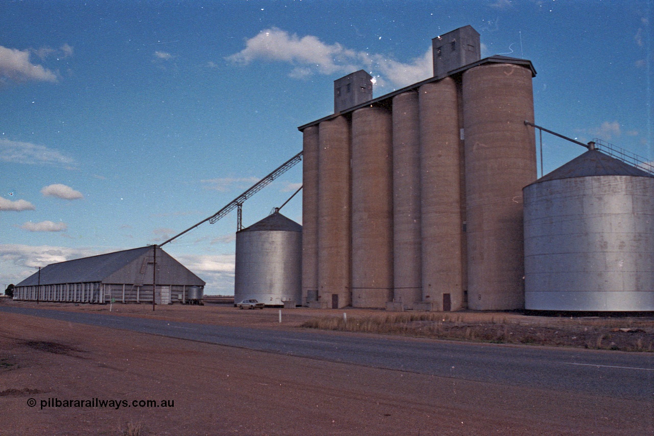 101-30
Litchfield, Geelong style silos complex with steel annexes and horizontal grain bunker, overview, road side.
