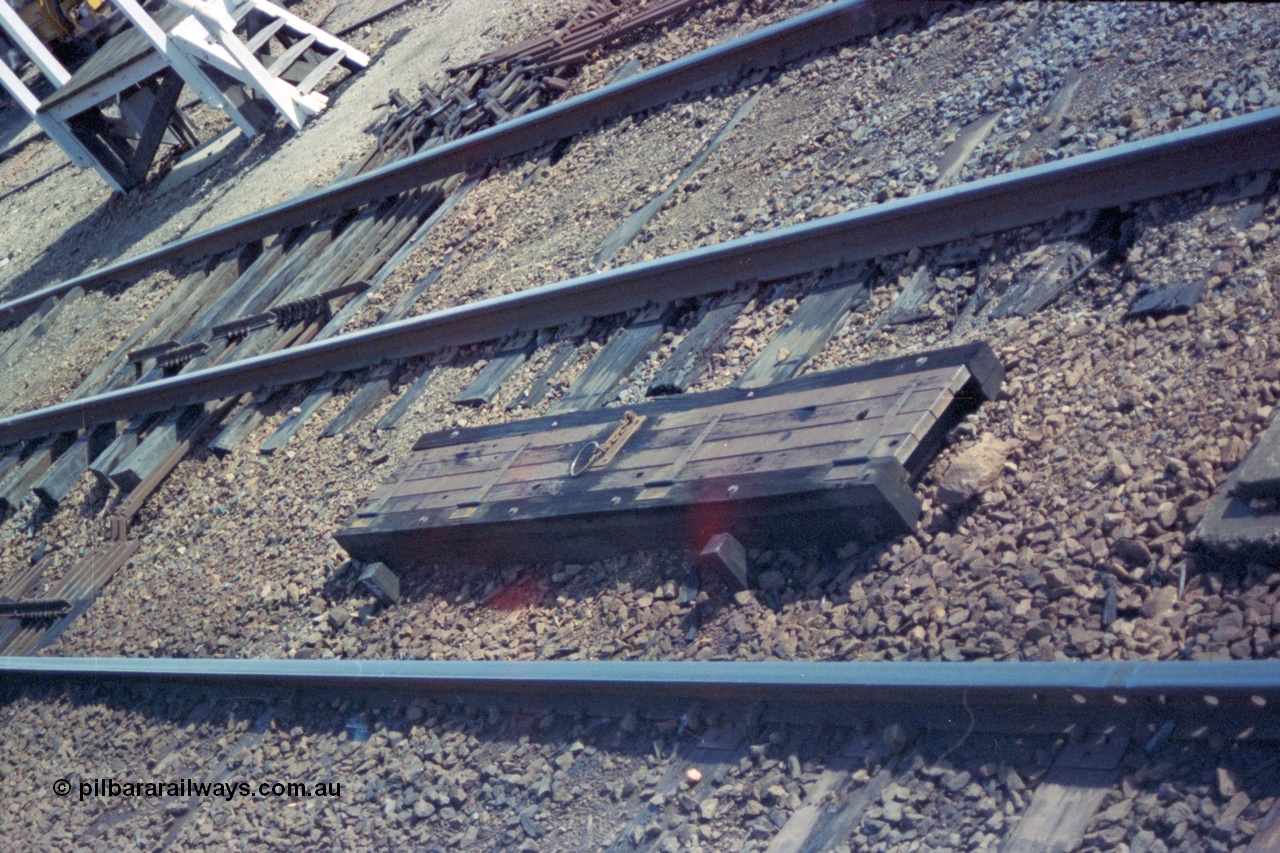 103-01
Springhurst automatic staff exchanger cover in-between broad gauge running lines, point rodding under tracks.
