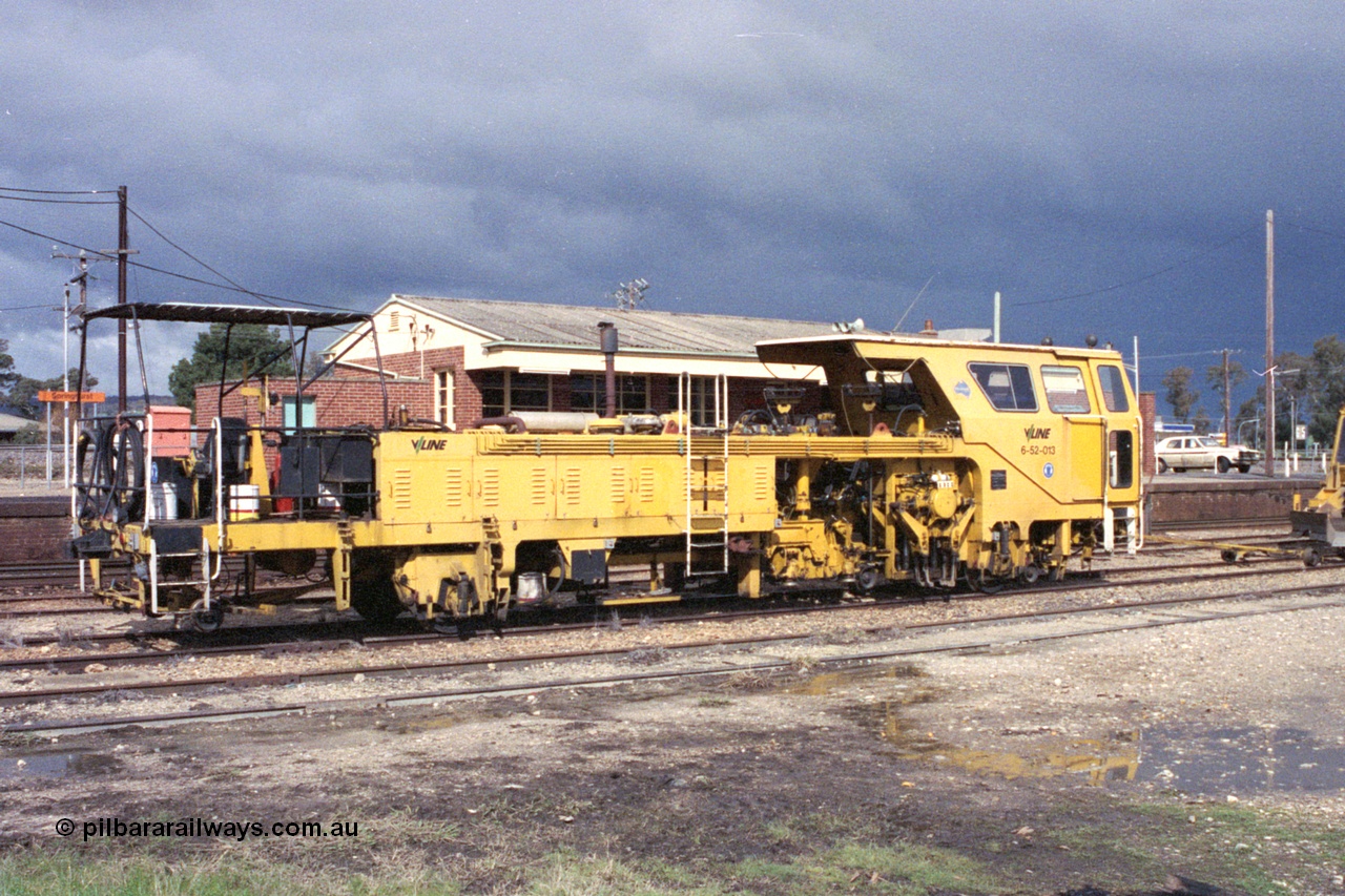 103-06
Springhurst V/Line broad gauge Plasser 07-16B Production Tamper or track tamper with V/Line asset number 6-52-013.
Keywords: Plasser;07-16B;track-machine;