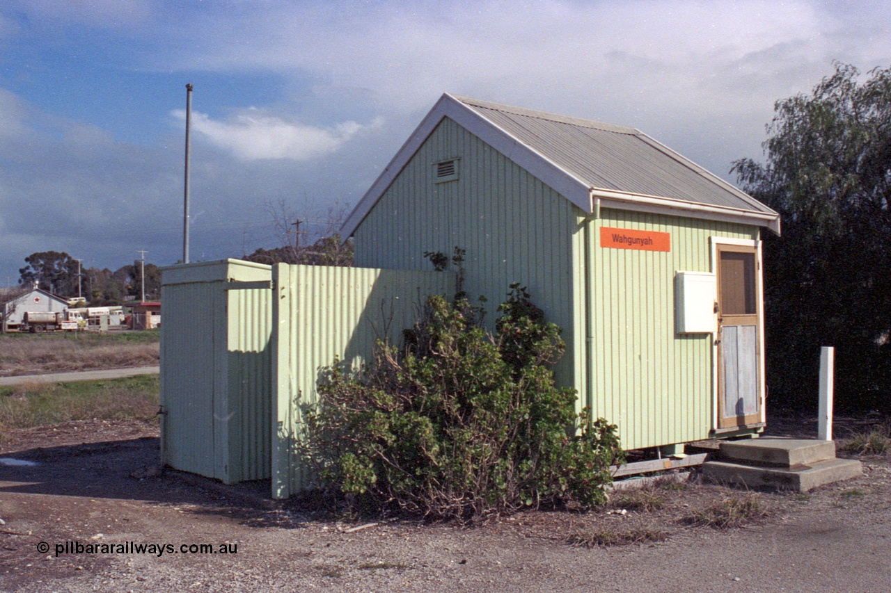 103-16
Wahgunyah portable station building, staff hut, 3/4 view, LHS showing ablution block.
