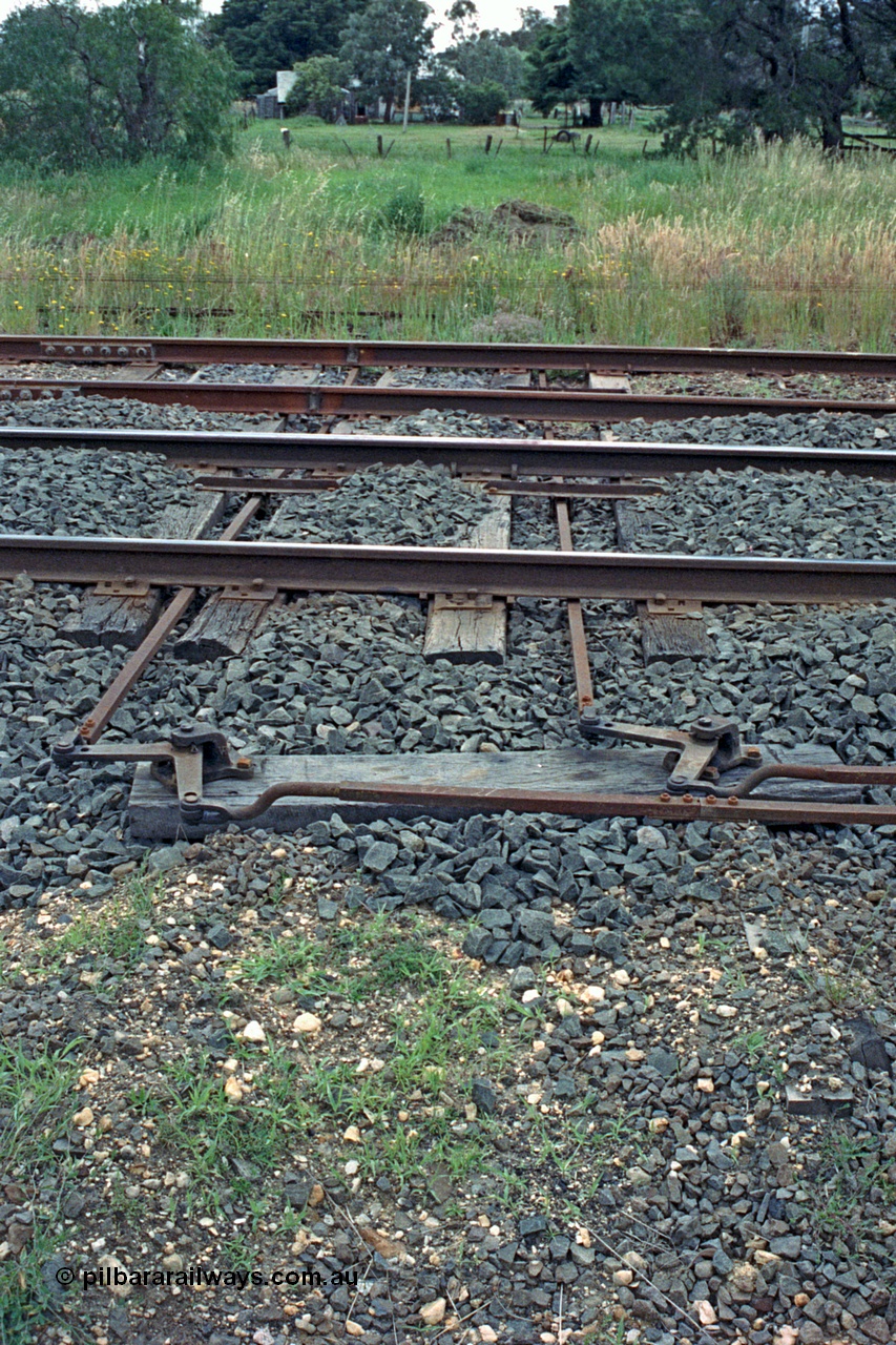 104-09
Buangor crossing loop, detail shot of point rodding changing direction and passing under the tracks.
