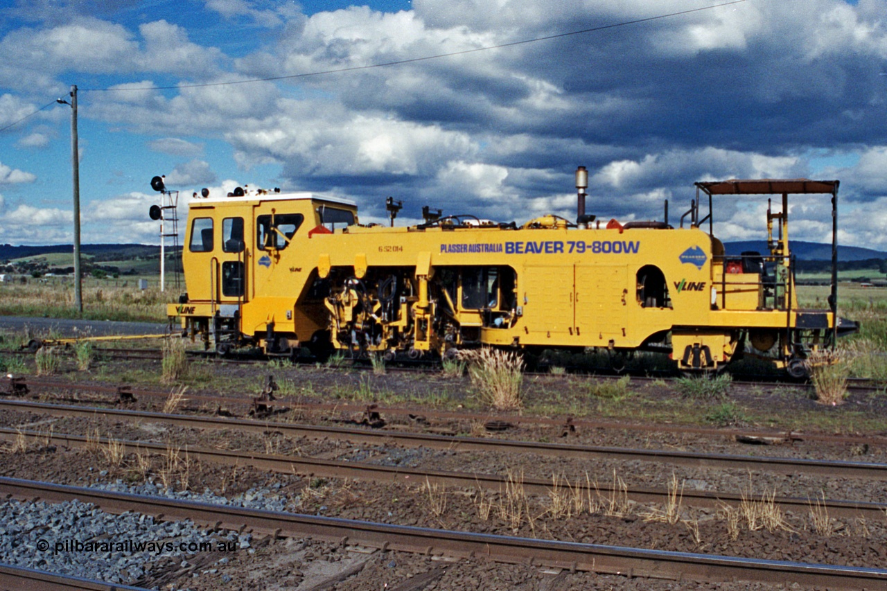 104-23
Wallan, V/Line broad gauge track machine with asset number 6-52-014, Plasser Beaver tamper model 79-800W track tamper on No.3 Rd, point rodding, standard gauge loop in background.
Keywords: Plasser;Beaver;79-800W;track-machine;