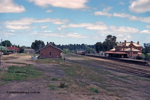 104-04
Stawell station yard overview, goods shed at left, Dimboola pass departing crossing Seaby St.
