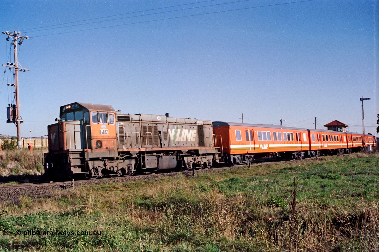 105-05
Wallan, V/Line broad gauge P class P 14 Clyde Engineering EMD model G18HBR serial 84-1208 rebuilt from T 330 Clyde Engineering EMD model G8B serial 56-85 departs with down passenger train 8323 and H set.
Keywords: P-class;P14;Clyde-Engineering-Somerton-Victoria;EMD;G18HBR;84-1208;rebuild;