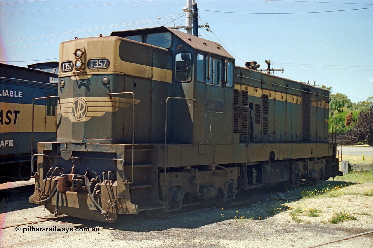 105-35
Seymour loco depot, ex-V/Line broad gauge T class T 357 Clyde Engineering EMD model G8B serial 61-242, still in VR livery under SRHC ownership.
Keywords: T-class;T357;Clyde-Engineering-Granville-NSW;EMD;G8B;61-242;