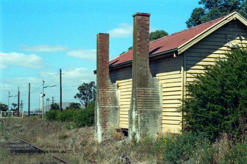 105-17
Wallan, station platform 2 waiting room, brick chimneys, rear elevation from north end wall view.
