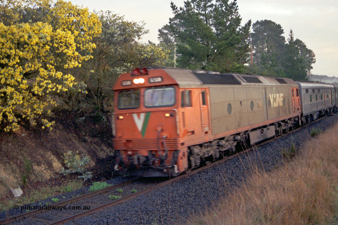 106-12
Kilmore East, V/Line standard gauge G class loco G 518 Clyde Engineering EMD model JT26C-2SS serial 85-1231 with the up Melbourne Express, off focus.
Keywords: G-class;G518;Clyde-Engineering-Rosewater-SA;EMD;JT26C-2SS;85-1231;