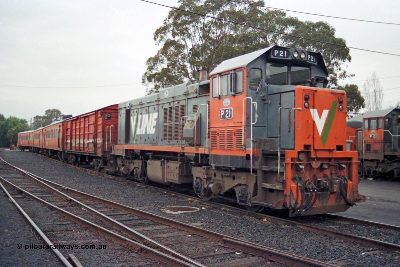 106-20
Seymour broad gauge passenger stabling yard, V/Line P class P 21 Clyde Engineering EMD model G18HBR serial 84-1214 rebuilt from flat-top T class T 338 Clyde Engineering EMD model G8B serial 56-114 with D van and orange 'Tea Cup' liveried H set SH 28.
Keywords: P-class;P21;Clyde-Engineering-Somerton-Victoria;EMD;G18HBR;84-1214;rebuild;