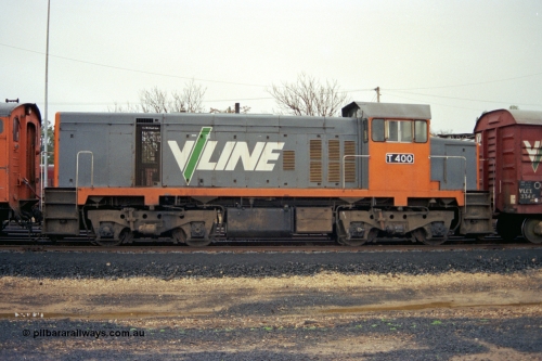 106-15
Seymour, rationalised yard, V/Line broad gauge T class T 400 Clyde Engineering EMD model G18B serial 67-495, stabled down Wodonga goods 9303, side view.
Keywords: T-class;T400;Clyde-Engineering-Granville-NSW;EMD;G18B;67-495;