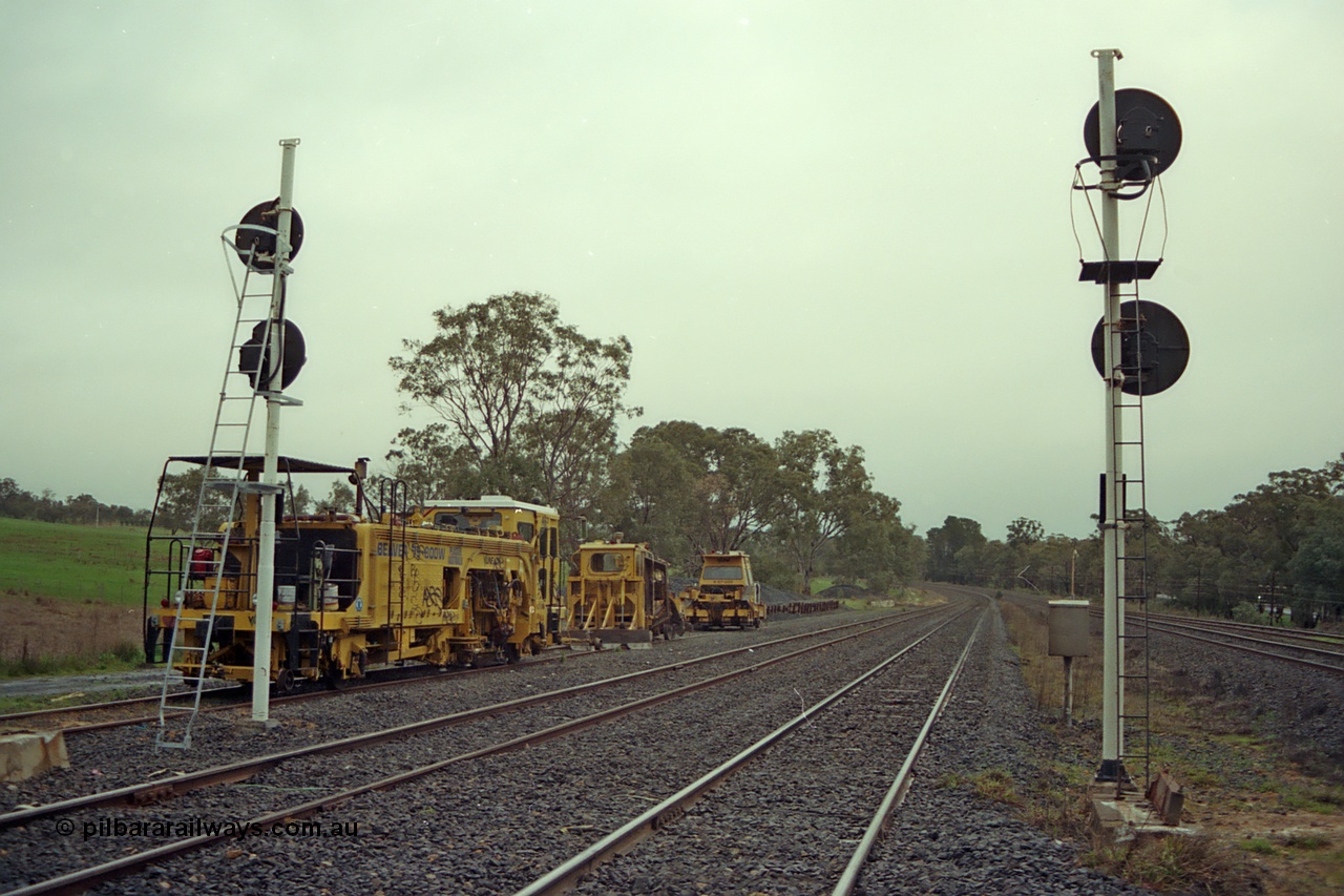 109-05
Broadford Loop, standard gauge, track machines, tamper, regulator, looking south, new signals.
Keywords: track-machine;