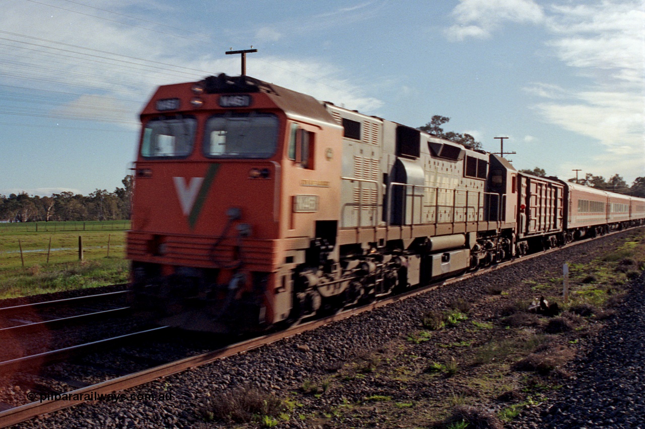 109-10
Dysart, V/Line broad gauge N class N 461 'City of Ararat' Clyde Engineering EMD model JT22HC-2 serial 86-1190 with up Albury passenger train, off focus.
Keywords: N-class;N461;Clyde-Engineering-Somerton-Victoria;EMD;JT22HC-2;86-1190;