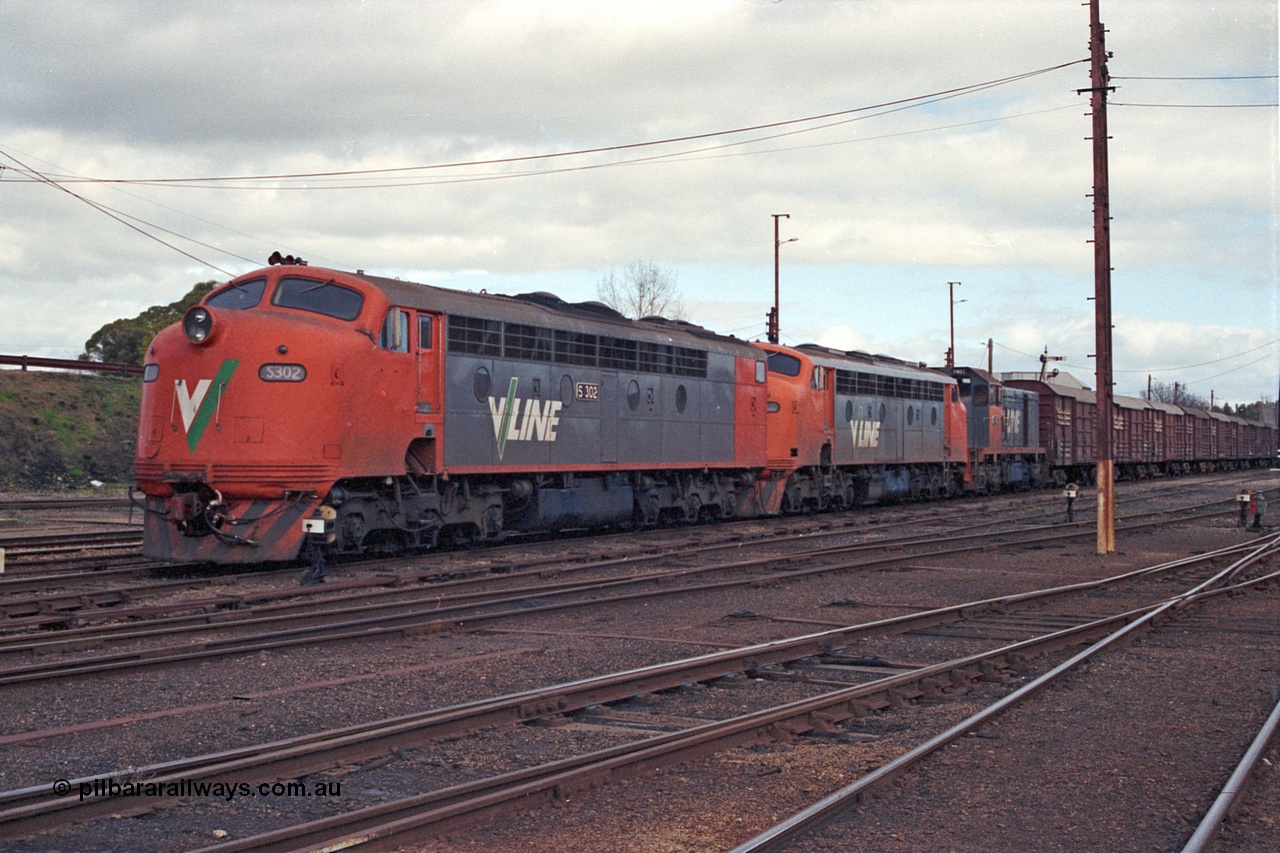 109-24
Benalla, yard view, V/Line broad gauge S class S 302 'Edward Henty' Clyde Engineering EMD model A7 serial 57-166, B class B 64 Clyde Engineering EMD model ML2 serial ML2-5 and T class T 403 Clyde Engineering EMD model G18B serial 67-498 with stabled down Wodonga goods train 9303, point indicators, louvre vans.
Keywords: S-class;S302;Clyde-Engineering-Granville-NSW;EMD;A7;57-166;bulldog;