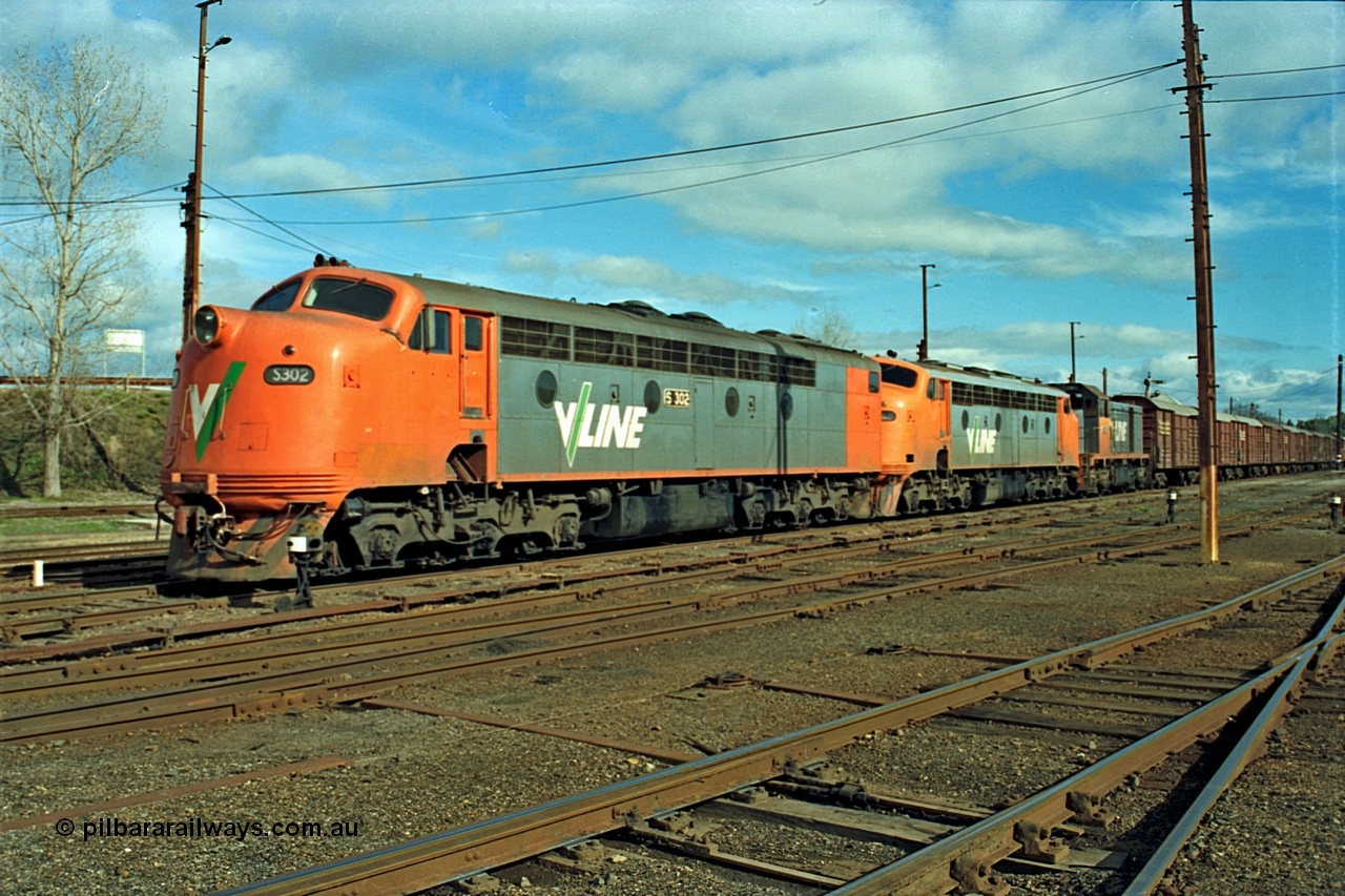 110-11
Benalla yard overview, broad gauge V/Line S class S 302 'Edward Henty' Clyde Engineering EMD model A7 serial 57-166, B class B 64 Clyde Engineering EMD model ML2 serial ML2-5 and V/Line T class loco T 403 with serial 67-498 a Clyde Engineering Granville NSW built EMD model G18B with stabled down Wodonga goods train 9303, point indicators.
Keywords: S-class;S302;Clyde-Engineering-Granville-NSW;EMD;A7;57-166;bulldog;B-class;B64;ML2;ML2-5;T-class;T403;G18B;67-498;