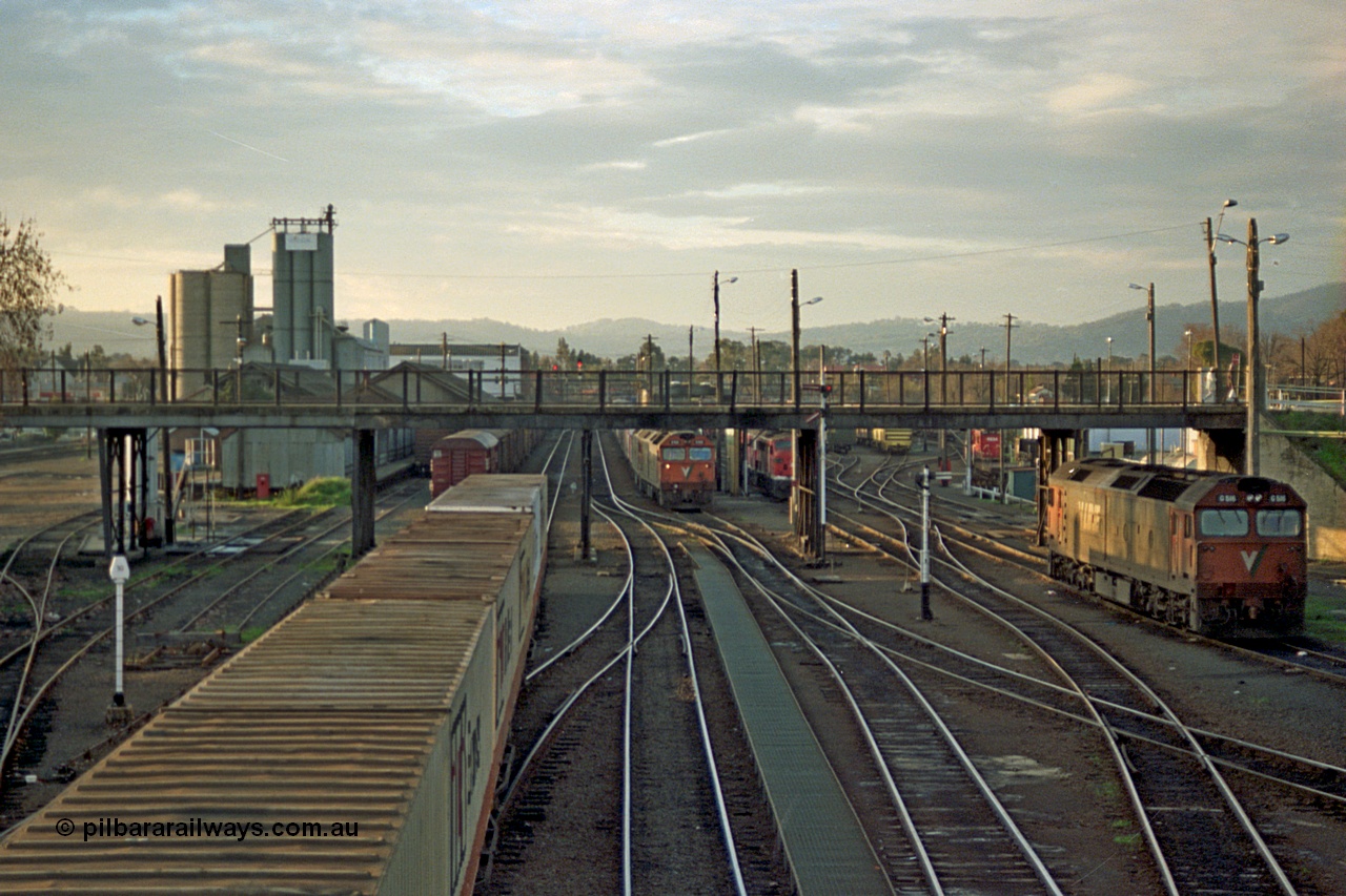 110-24
Albury station yard overview looking north from station footbridge, V/Line standard gauge G class Clyde Engineering EMD model JT26C-2SS locos, track view.
Keywords: G-class;Clyde-Engineering-Somerton-Victoria;EMD;JT26C-2SS;