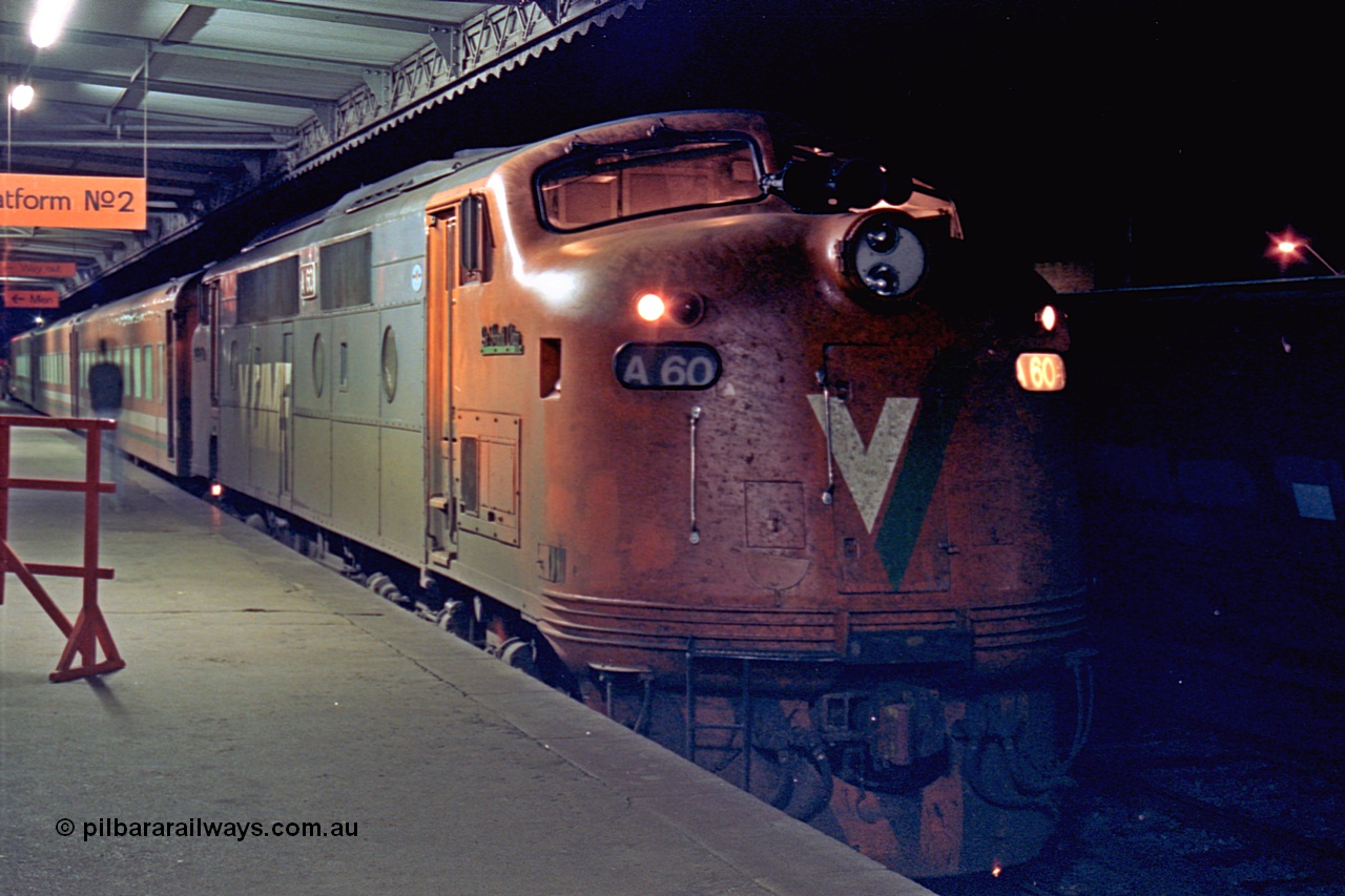 110-31
Seymour station platform two, V/Line broad gauge A class A 60 'Sir Harold Clapp' Clyde Engineering EMD model AAT22C-2R serial 84-1184 rebuilt from B 60 'Sir Harold Clapp' Clyde Engineering EMD model ML2 serial ML2-1, down Cobram passenger train 8345.
Keywords: A-class;bulldog;A60;Clyde-Engineering-Rosewater-SA;EMD;AAT22C-2R;84-1184;rebuild;