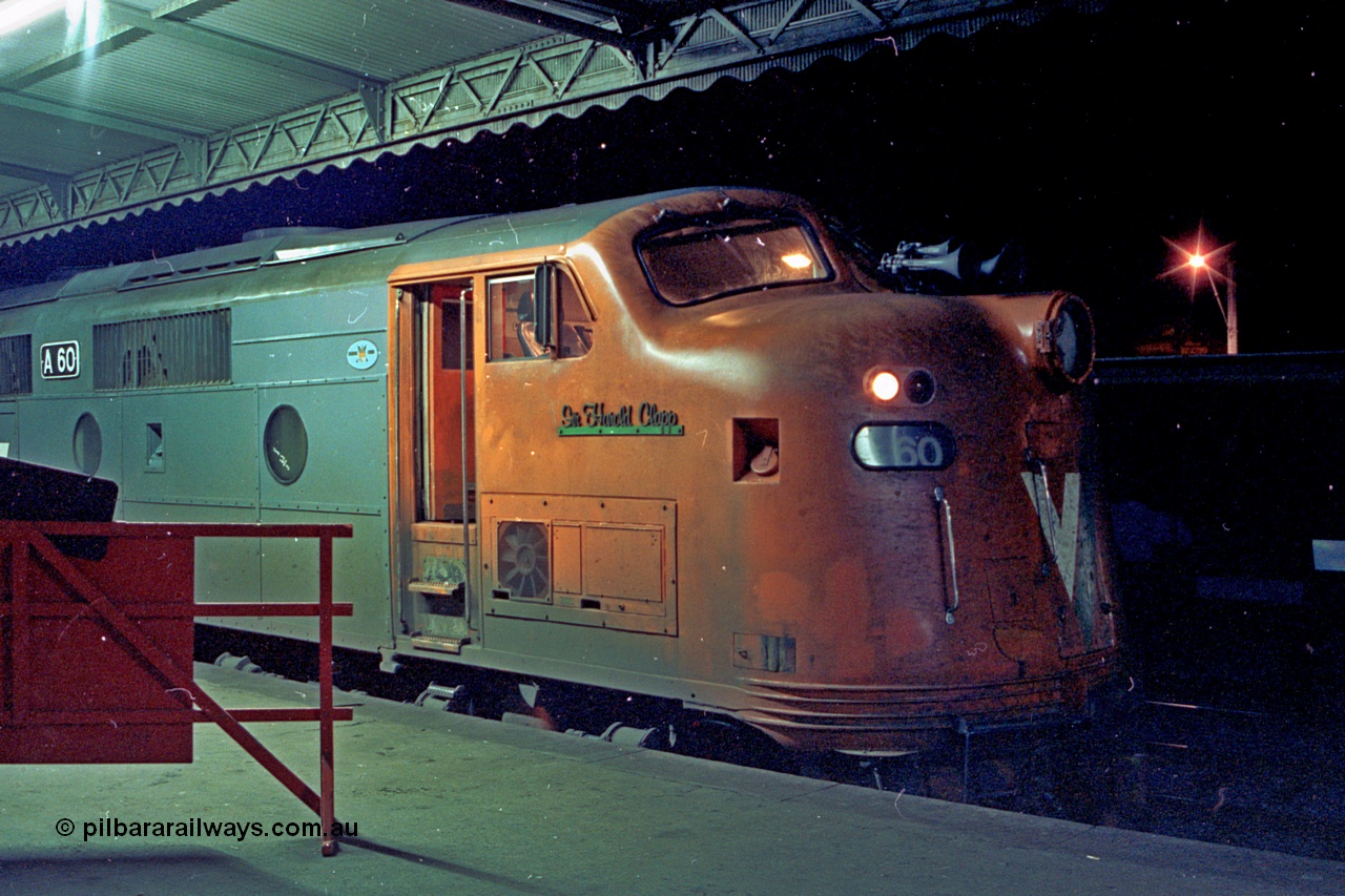 110-33
Seymour station platform two, V/Line broad gauge A class A 60 'Sir Harold Clapp' Clyde Engineering EMD model AAT22C-2R serial 84-1184 rebuilt from B 60 'Sir Harold Clapp' Clyde Engineering EMD model ML2 serial ML2-1, down Cobram passenger train 8345.
Keywords: A-class;bulldog;A60;Clyde-Engineering-Rosewater-SA;EMD;AAT22C-2R;84-1184;rebuild;