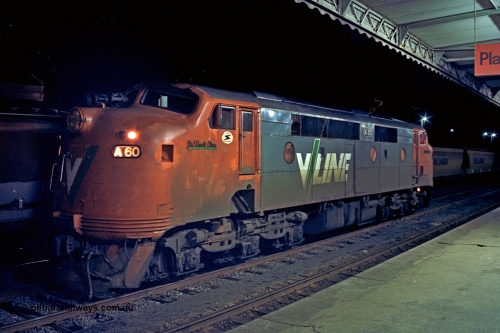 110-25
Seymour station platform, V/Line broad gauge A class locomotive A 60 'Sir Harold Clapp' Clyde Engineering EMD model AAT22C-2R serial 84-1184 rebuilt from B 60 'Sir Harold Clapp' Clyde Engineering EMD model ML2 serial ML2-1 waiting to run the Sunday evening down Cobram passenger train 8345.
Keywords: A-class;A60;Clyde-Engineering-Rosewater-SA;EMD;AAT22C-2R;84-1184;rebuild;bulldog;