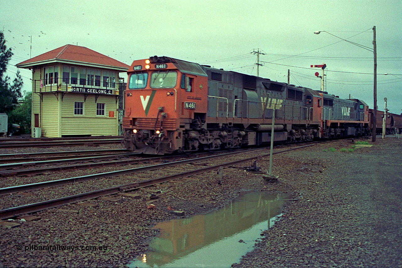 111-04
North Geelong C Box, V/Line broad gauge locos N class N 461 'City of Ararat' Clyde Engineering EMD model JT22HC-2 serial 86-1190 and X class X 47 Clyde Engineering EMD model G26C serial 75-794 head down the grain loop line, signal box, semaphore signal post, the line in the foreground is the Loop Line to Melbourne.
Keywords: N-class;N461;Clyde-Engineering-Somerton-Victoria;EMD;JT22HC-2;86-1190;