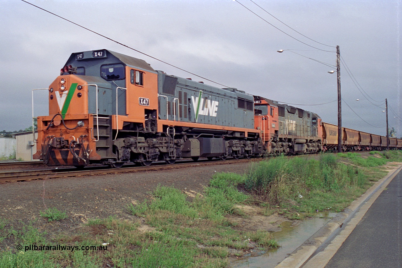 111-17
North Geelong grain arrivals yard, V/Line broad gauge loco X class X 47 Clyde Engineering EMD model G26C serial 75-794 and N class N 461 'City of Ararat' Clyde Engineering EMD model JT22HC-2 serial 86-1190, loaded grain rake, waiting access to the grain loop.
Keywords: X-class;X47;Clyde-Engineering-Rosewater-SA;EMD;G26C;75-794;