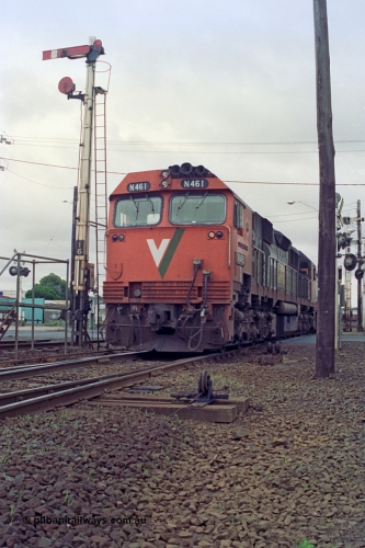 111-26
North Geelong C Box, V/Line broad gauge locomotives N class N 461 'City of Ararat' Clyde Engineering EMD model JT22HC-2 serial 86-1190 with X class X 47 Clyde Engineering EMD model G26C serial 75-794 run past semaphore signal post 16 with another loaded grain train from the grain arrival roads bound for the grain loop.
Keywords: N-class;N461;Clyde-Engineering-Somerton-Victoria;EMD;JT22HC-2;86-1190;