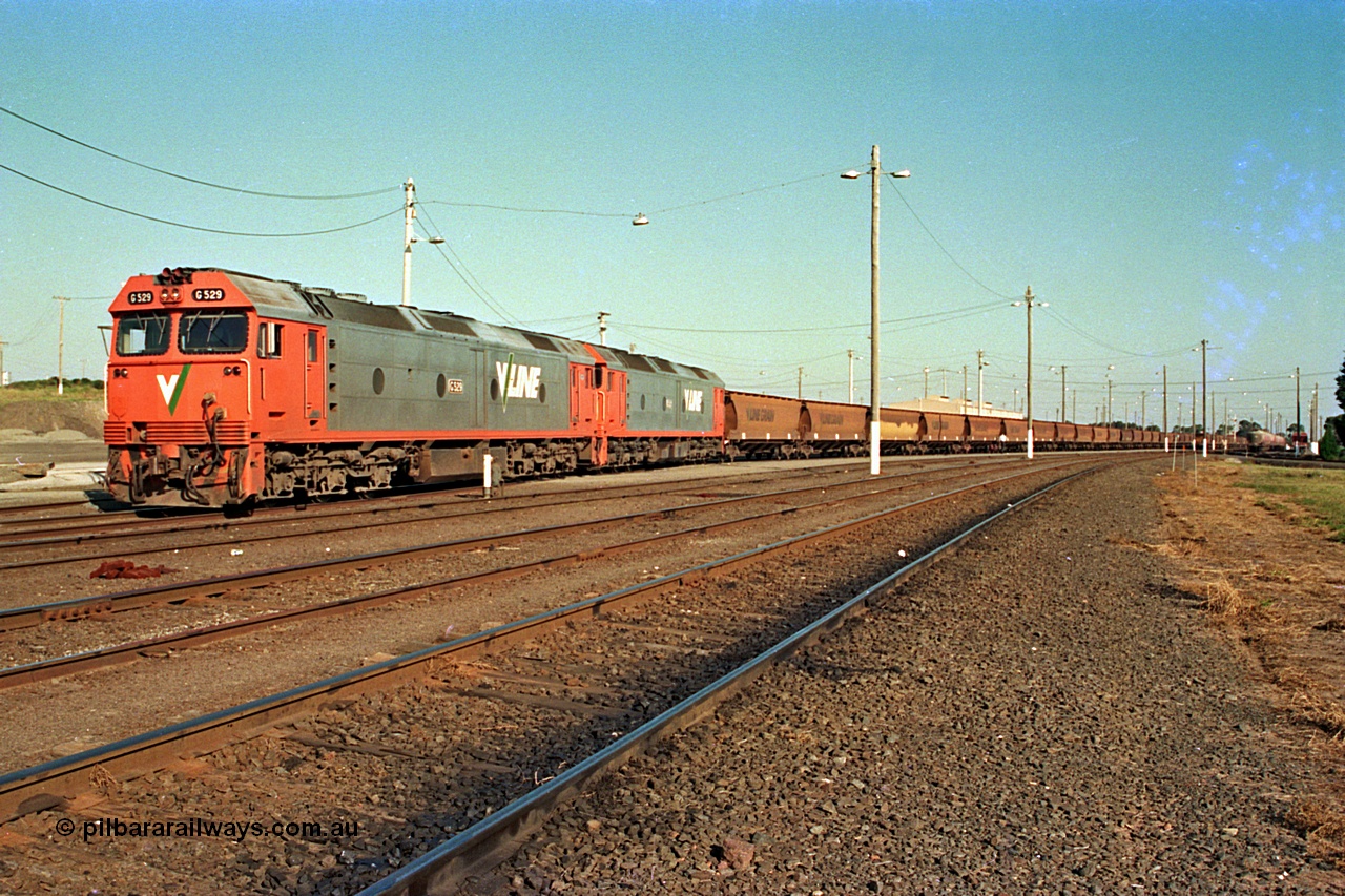 112-36
North Geelong yard view, V/Line broad gauge G class G 529 Clyde Engineering EMD model JT26C-2SS serial 88-1259 and another G class with an empty grain train waiting for departure time.
Keywords: G-class;G529;Clyde-Engineering-Somerton-Victoria;EMD;JT26C-2SS;88-1259;