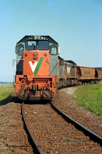 112-21
North Geelong grain loop, V/Line broad gauge locos H class H 2 Clyde Engineering EMD model G18B serial 68-630, H 5 serial 68-632 and H 4 serial 68-633 shunt around the grain loop unloading a grain train.
Keywords: H-class;H2;Clyde-Engineering-Granville-NSW;EMD;G18B;68-630;H5;68-632;H4;68-633;