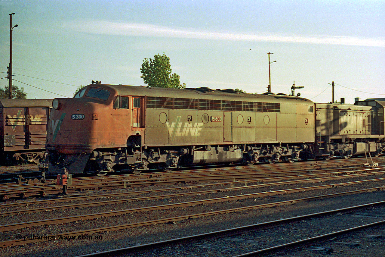 114-30
Benalla yard broad gauge V/Line S class leader S 300 'Matthew Flinders' Clyde Engineering EMD model A7 serial 57-164, point indicator and ground disc signal, stabled down Wodonga goods train 9303.
Keywords: S-class;S300;Clyde-Engineering-Granville-NSW;EMD;A7;57-164;bulldog;