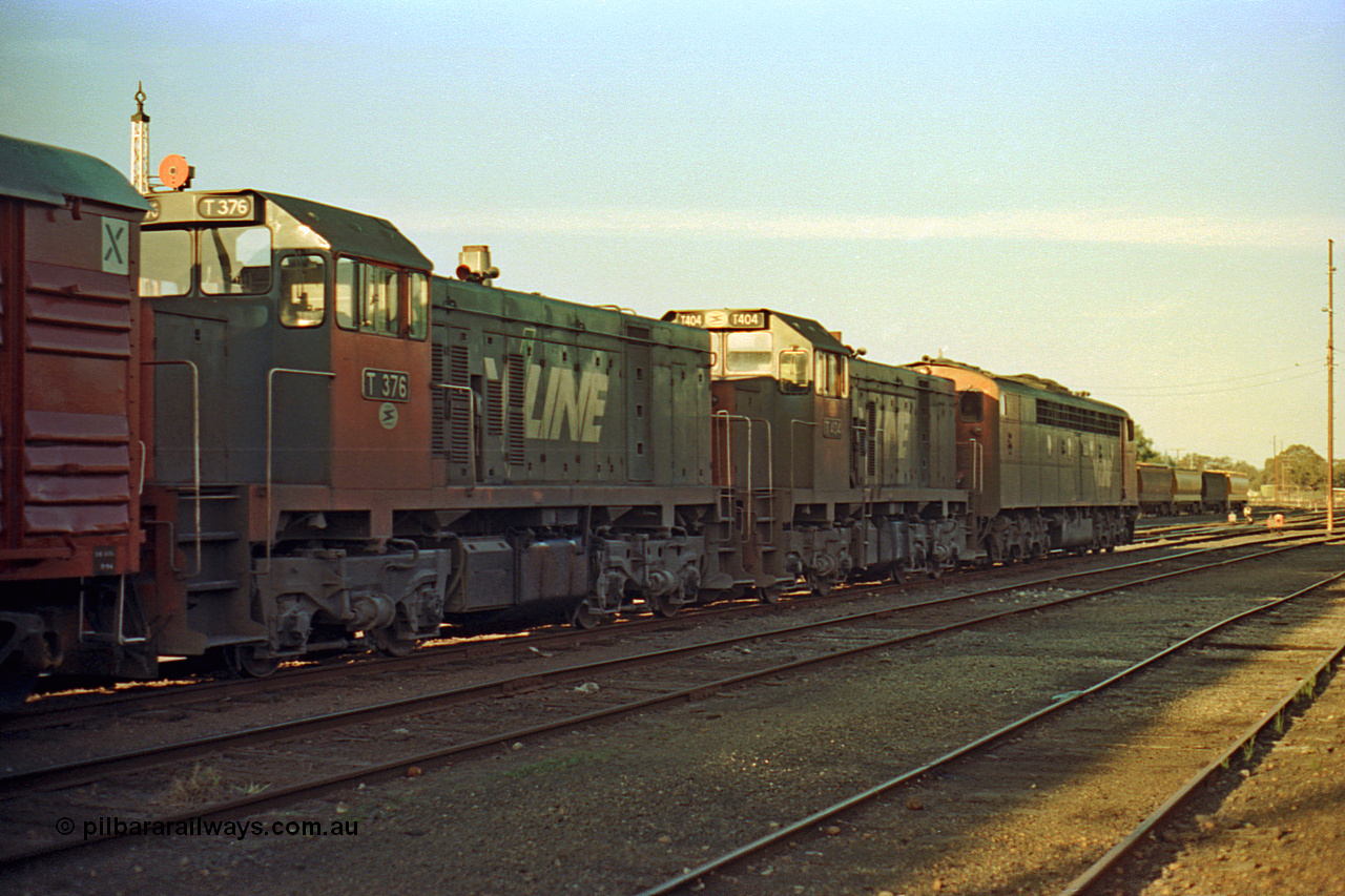 114-32
Benalla yard broad gauge V/Line S class leader S 300 'Matthew Flinders' Clyde Engineering EMD model A7 serial 57-164 and T classes T 404 Clyde Engineering EMD model G18B serial 67-499 and T 376 Clyde Engineering EMD model G8B serial 64-331, stabled on No. 5 Road with the down Wodonga goods train 9303, trailing view.
Keywords: S-class;S300;Clyde-Engineering-Granville-NSW;EMD;A7;57-164;bulldog;T-class;T404;G18B;67-499;T376;G8B;64-331;