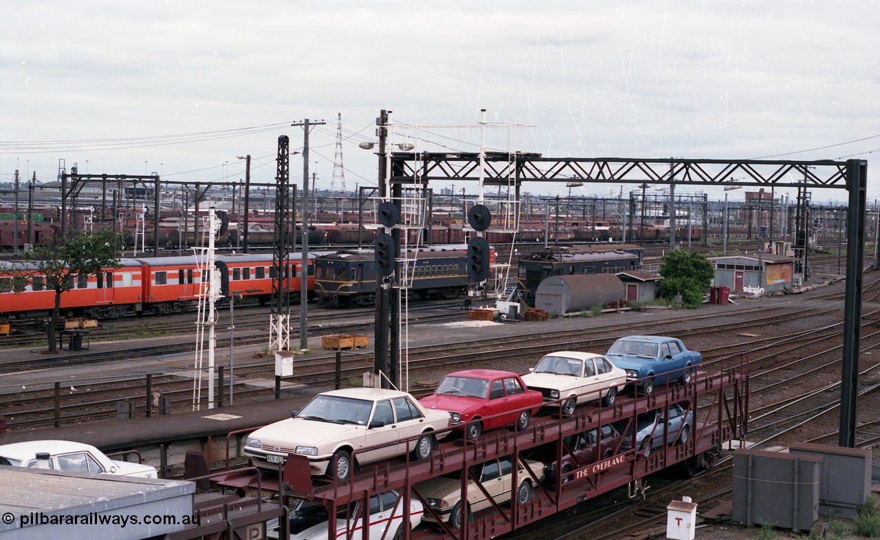 116-04
Spencer Street Station, view looking west from flyover, V/Line standard gauge yard pilot Y class Y 150 Clyde Engineering EMD model G6B serial 65-416 is waiting to shunt the overnight train from Sydney in platform No.1, shows the gauge separation point with the broad gauge line visible peeling off to the left, in the background are the 'Bank Sidings' where the country passenger fleet are stabled, with Dudley Street Sidings in the distance.
Keywords: Y-class;Y150;65-416;Clyde-Engineering-Granville-NSW;EMD;G6B;