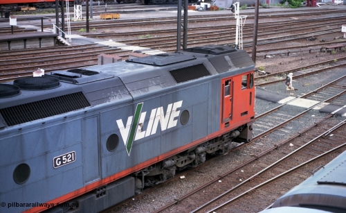116-15
Spencer Street Station, view from the flyover looking down upon V/Line standard gauge G class locomotive G 521 Clyde Engineering EMD model JT26C-2SS serial 85-1234 as it waits for ground dwarf signal 167 to clear.
Keywords: G-class;G521;Clyde-Engineering-Rosewater-SA;EMD;JT26C-2SS;85-1234;