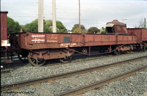 117-14
Benalla, stored broad gauge waggons, VHNA type bogie ballast waggon with plate frame bogies VHNA 72, stencilled 'Held for ARHS'. Built by Newport Workshops in June 1913 at QN type, in February 1981 recoded to VHNA type and placed off register in May 1984. 
Keywords: VHNA-type;VHNA72;Victorian-Railways-Newport-WS;QN-type;