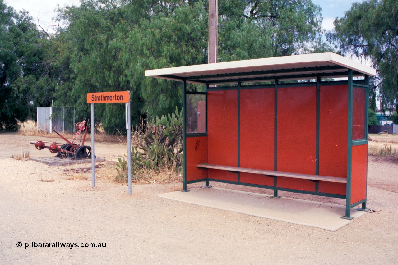 118-02
Strathmerton station platform signal bay, signal levers, bus shelter type platform building, waiting shelter, station sign, toilet block.
