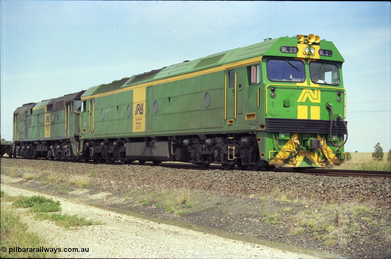 119-27
Parwan Loop, Australian National broad gauge locos BL class BL 29 Clyde Engineering EMD model JT26C-2SS serial 83-1013 and 700 class 703 AE Goodwin ALCo model DL500G serial G6059-1 with down Adelaide goods train 9145 holding the mainline.
Keywords: BL-class;BL29;Clyde-Engineering-Rosewater-SA;EMD;JT26C-2SS;83-1013;