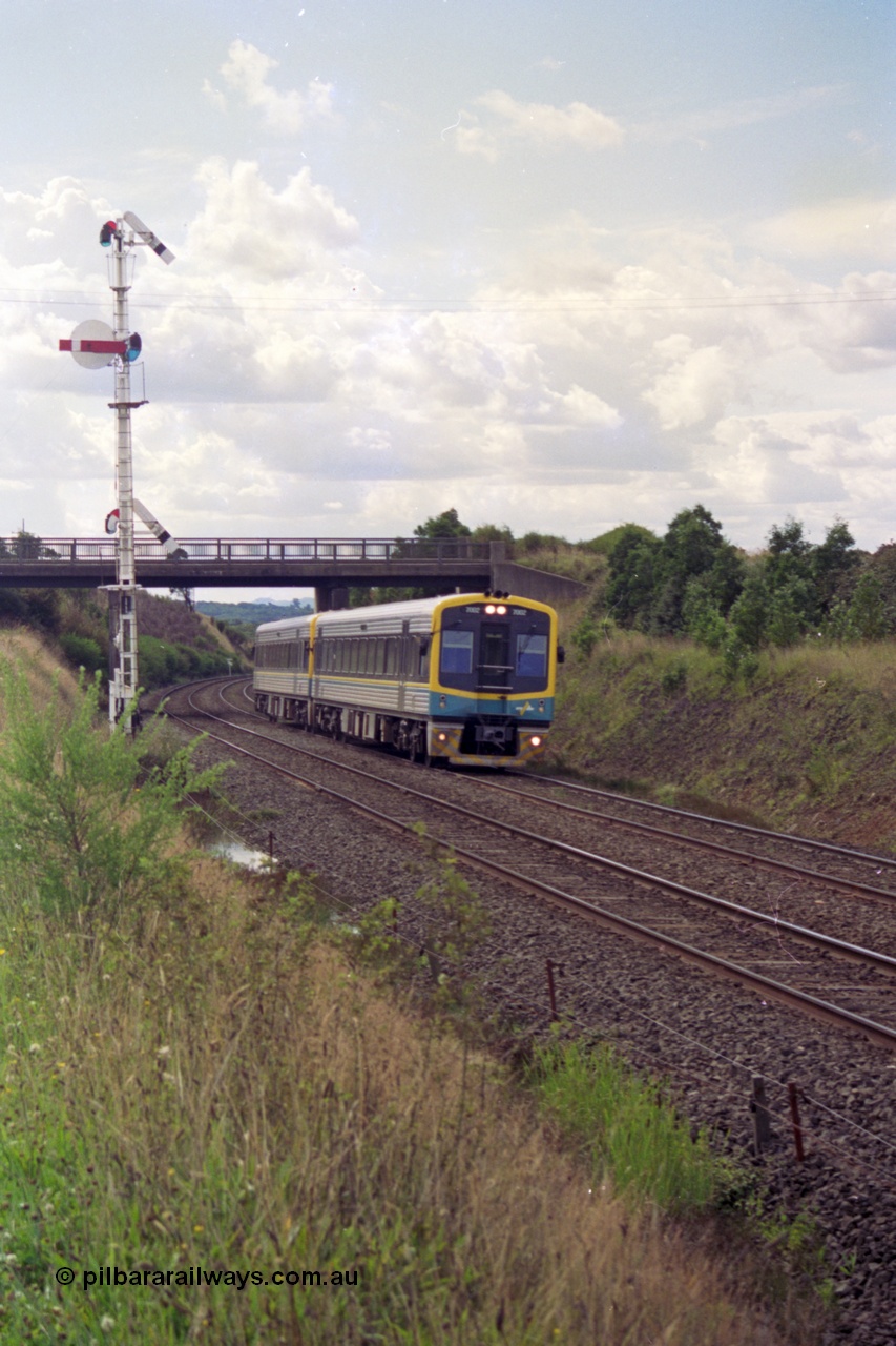 119-33
Warrenheip, V/Line broad gauge Sprinter 7002 and a sister, built by Goninan NSW as LDRPV class in 1993 with an 88 passenger capacity, work an up Ballarat passenger train past semaphore signal post 11.
Keywords: Sprinter;Goninan-NSW;LDRPV-class;7002;