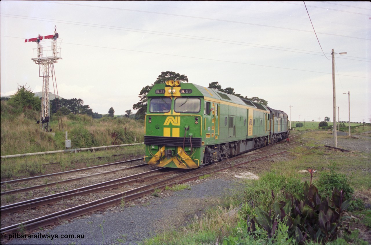 119-36
Warrenheip, Australian National broad gauge locos BL class BL 29 Clyde Engineering EMD model JT26C-2SS serial 83-1013 and 700 class 703 AE Goodwin ALCo model DL500G serial G6059-1 with down Adelaide goods train 9145 come off the Bacchus Marsh line at Warrenheip, following a 2 hour wait at Bungaree Loop, semaphore signal post 9 on the left.
Keywords: BL-class;BL29;Clyde-Engineering-Rosewater-SA;EMD;JT26C-2SS;83-1013;