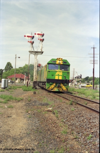 119-31
Bacchus Marsh Australian National broad gauge locos BL class BL 29 Clyde Engineering EMD model JT26C-2SS serial 83-1013 with 700 class 703 and train 9145 down Adelaide goods departing past up home semaphore signal post 10, signal post 10B and track for the old Maddingley Brown Coal sidings visible to the right.
Keywords: BL-class;BL29;Clyde-Engineering-Rosewater-SA;EMD;JT26C-2SS;83-1013;