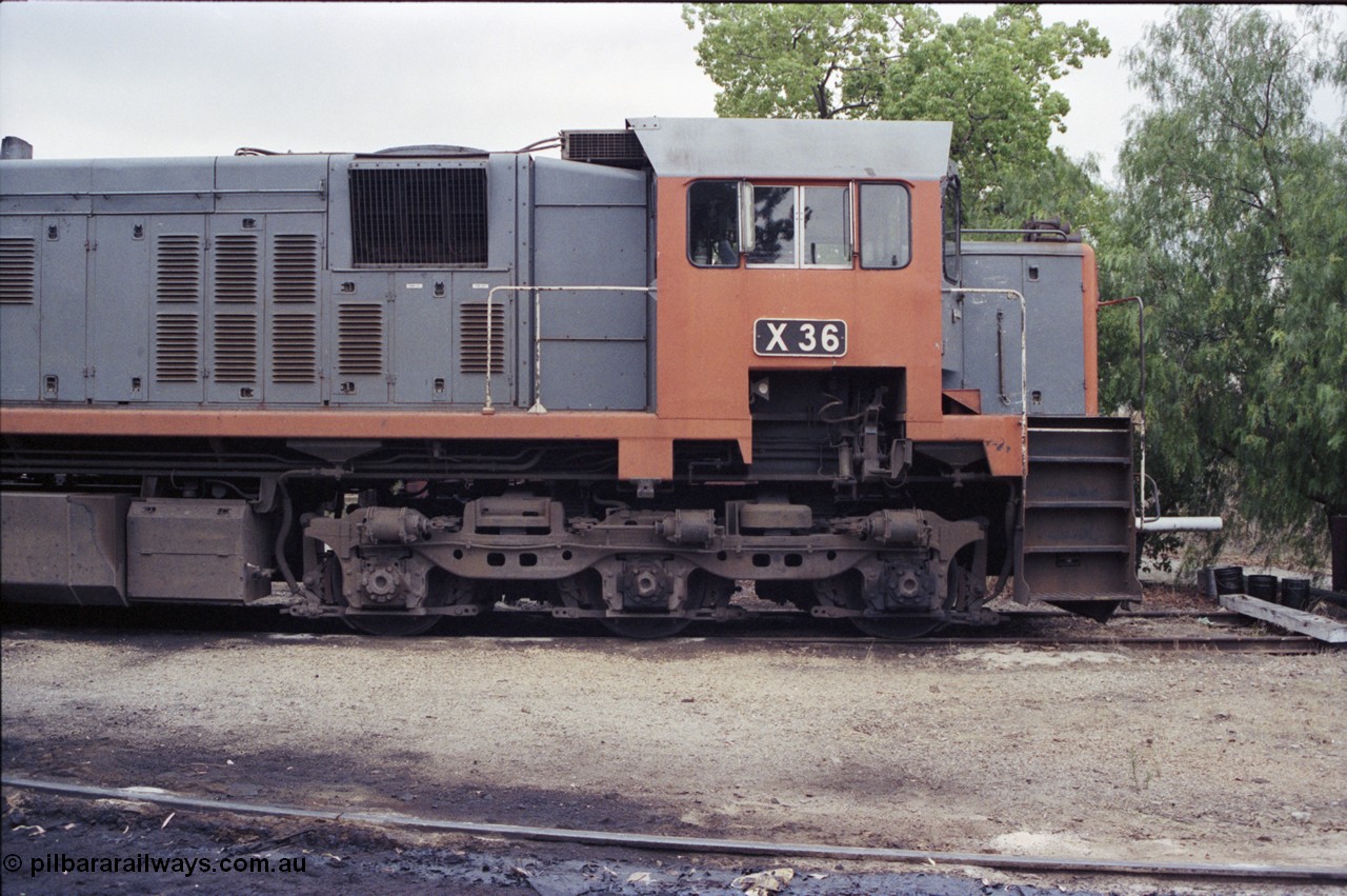 120-33
Wodonga loco depot, V/Line broad gauge loco X class X 36 Clyde Engineering EMD model G16C serial 66-489, RHS cab view showing bogie and staff exchanger.
Keywords: X-class;X36;66-489;Clyde-Engineering-Granville-NSW;EMD;G16C;