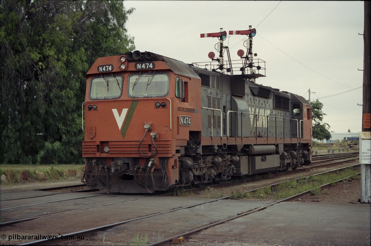 120-37
Wodonga, V/Line broad gauge loco N class N 474 'City of Traralgon' Clyde Engineering EMD model JT22HC-2 serial 87-1203, stabled near A Signal Box, under semaphore signal post 19.
Keywords: N-class;N474;Clyde-Engineering-Somerton-Victoria;EMD;JT22HC-2;87-1203;