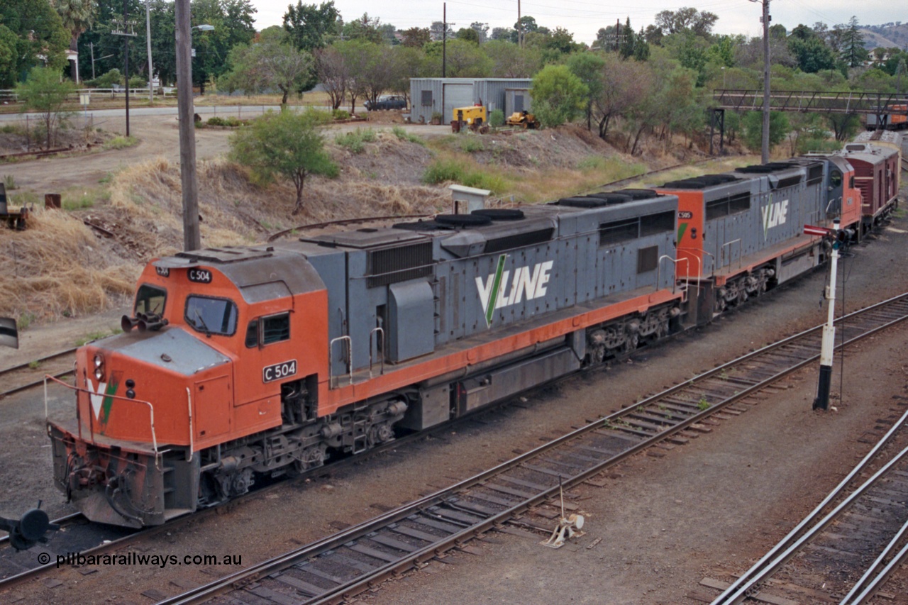 121-07
Albury loco depot, V/Line standard gauge C classes C 504 Clyde Engineering EMD model GT26C serial 76-827 and C 505 Clyde Engineering EMD model GT26C serial 76-828, elevated 3/4 view.
Keywords: C-class;C504;Clyde-Engineering-Rosewater-SA;EMD;GT26C;76-827;