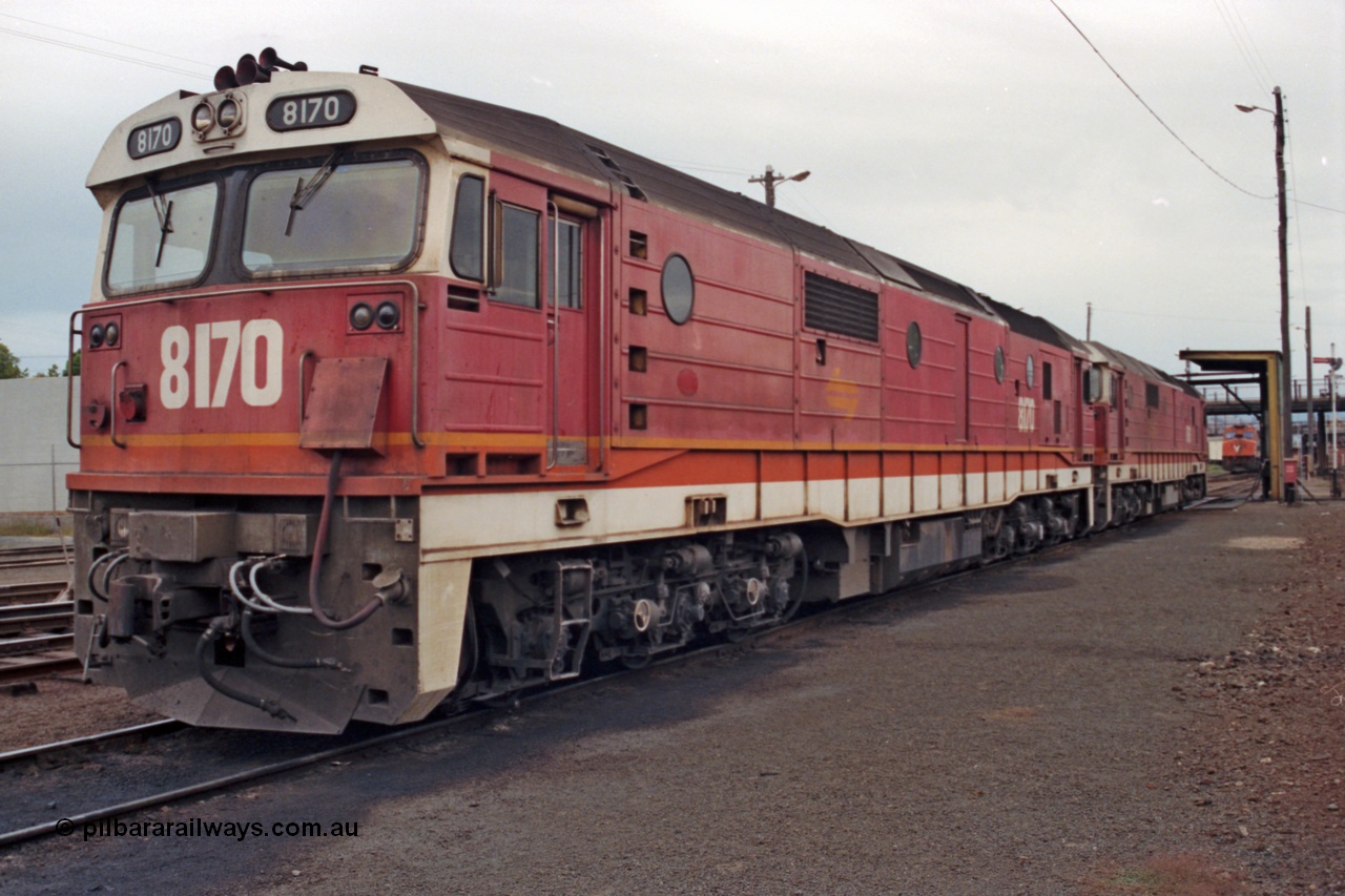 121-09
Albury yard loco depot, standard gauge NSWSRA 81 class 8170 Clyde Engineering EMD model JT26C-2SS serial 85-1089 in candy livery, with a sister 81 class, V/Line C class in the background, looking south.
Keywords: 81-class;8170;82-1089;Clyde-Engineering-Kelso-NSW;EMD;JT26C-2SS;