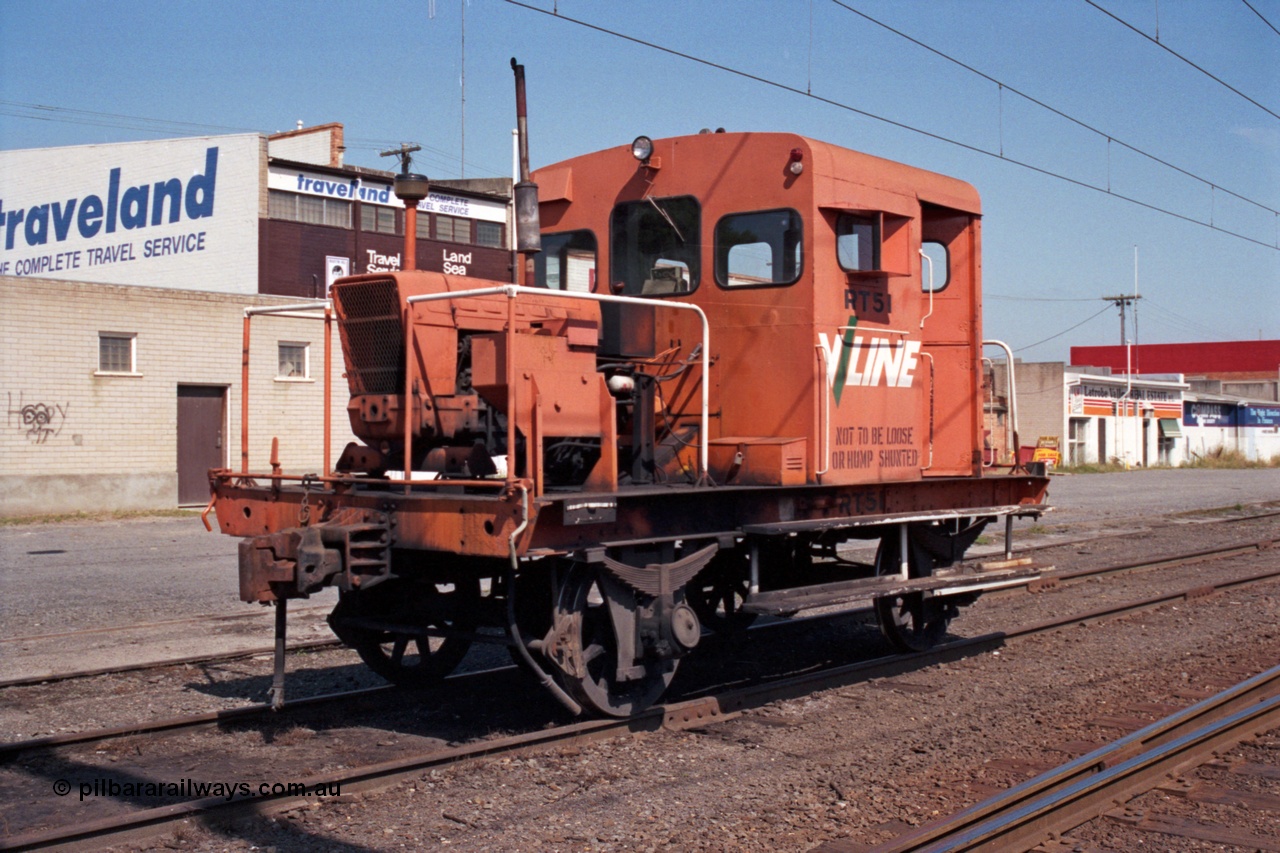 121-26
Morwell yard, V/Line broad gauge RT class rail tractor RT 51 basks in the morning sun. RT 51 started life as I type waggon I 6998 built by Victorian Railways October 1903, in 1929 converted to IA type, then September 1969 converted to the underframe of RT 51 by Ballarat North Workshops.
Keywords: RT-class;RT51;Victorian-Railways-Ballarat-Nth-WS;I-type;IA-type;I6998;IA6998;