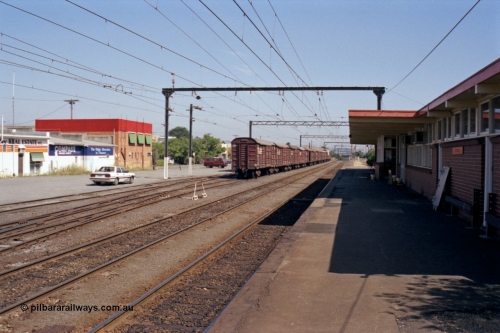 121-31
Morwell station yard overview and station building and platform, looking towards Melbourne, bogie louvre vans on No. 3 Road.
