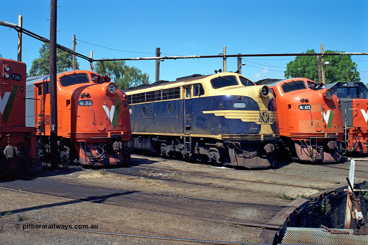 122-11
Traralgon loco depot, turntable roads, V/Line broad gauge locos: A class A 77 Clyde Engineering EMD model AAT22C-2R serial 83-1181 rebuilt from B class B 77 Clyde Engineering EMD model ML2 serial ML2-18, B class B 75 serial ML2-16 still in VR livery, A class A 81 serial 85-1189 rebuilt from B class B 81 serial ML2-22.
Keywords: B-class;B75;Clyde-Engineering-Granville-NSW;EMD;ML2;ML2-16;bulldog;