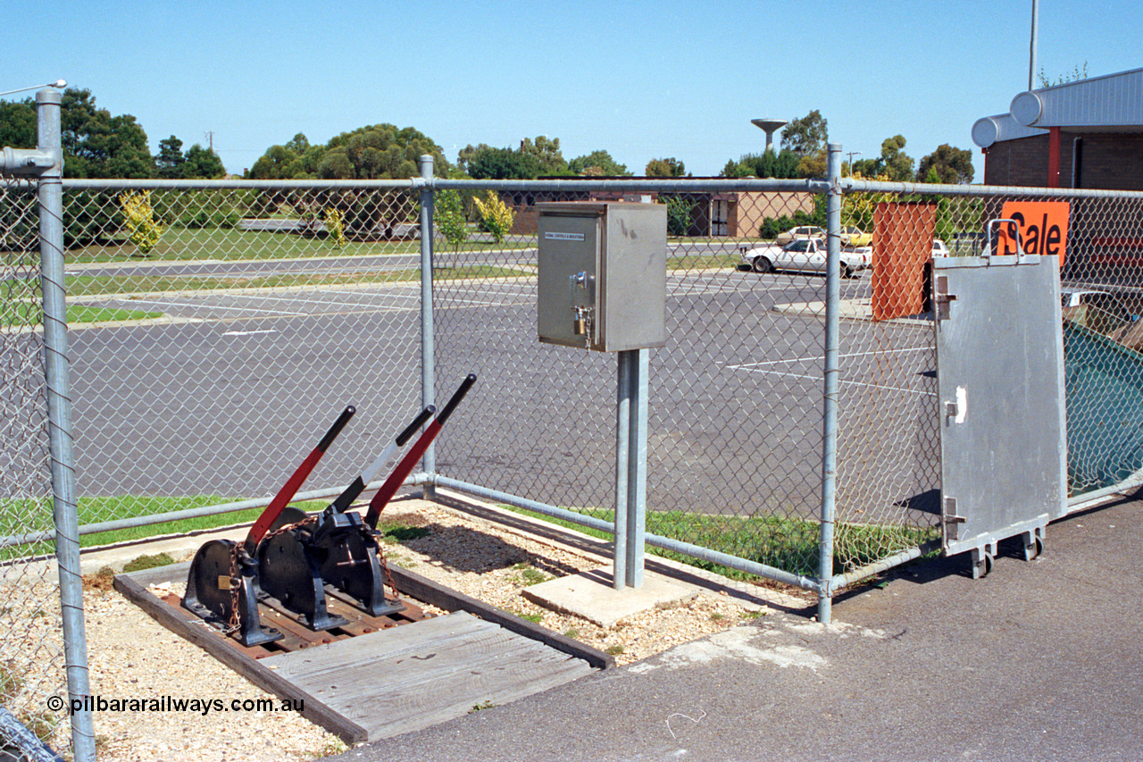 122-19
Sale station platform signal levers.
