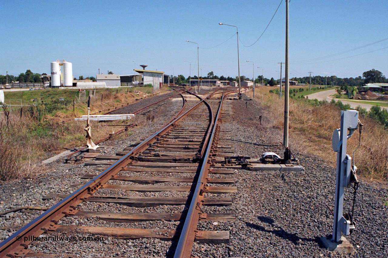 122-20
Sale station yard overview, looking from Bairnsdale end of yard, station in middle background on right, points, lever and interlocking.
