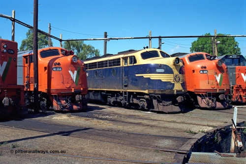 122-11
Traralgon loco depot, turntable roads, V/Line broad gauge locos: A class A 77 Clyde Engineering EMD model AAT22C-2R serial 83-1181 rebuilt from B class B 77 Clyde Engineering EMD model ML2 serial ML2-18, B class B 75 serial ML2-16 still in VR livery, A class A 81 serial 85-1189 rebuilt from B class B 81 serial ML2-22.
Keywords: B-class;B75;Clyde-Engineering-Granville-NSW;EMD;ML2;ML2-16;bulldog;